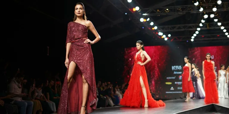 woman wearing maroon one-shoulder slit-side dress