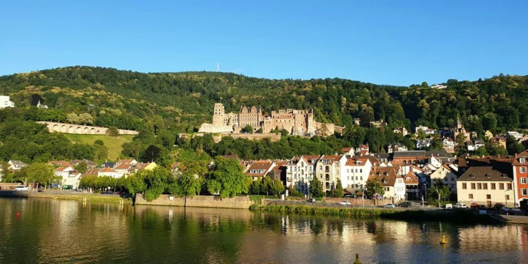 a river that has some buildings on the side of it