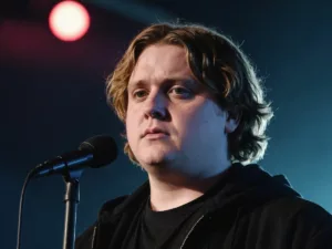 Lewis Capaldi looking somber on stage