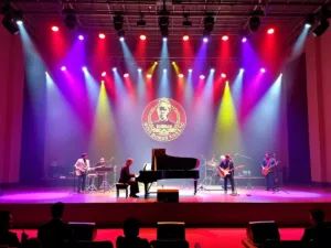 Concert stage in Dubai with musicians and grand piano.