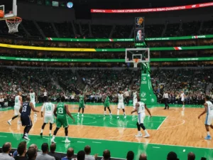 Celtics and Nuggets players in action