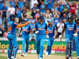 Cricketer celebrating wicket with teammates in a lively stadium.