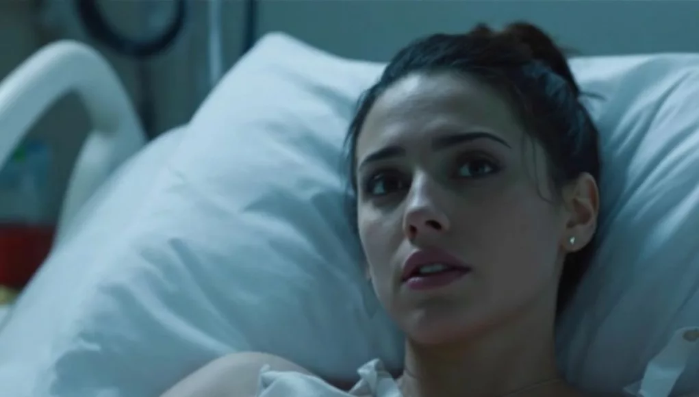 Halsey in a hospital bed, looking contemplative.