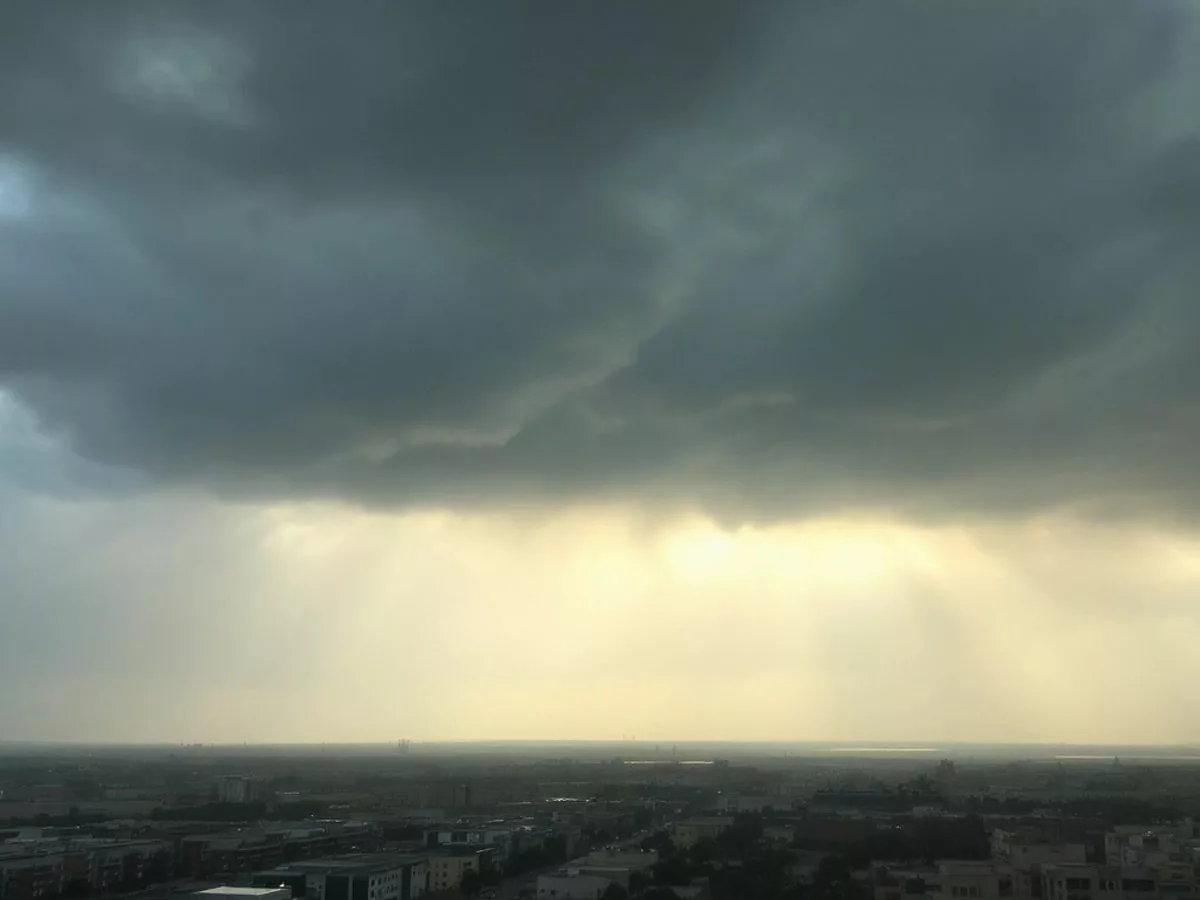 Dark clouds and dust swirl over the UAE landscape.