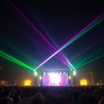 Lively crowd, vibrant stage lights, outdoor music festival