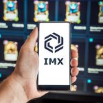 Russia Moscow 04.09.2021.Logo,screenshot of Immutable X, IMX token.Blockchain nft ethereum cryptocurrency game in laptop,mobile phone.Man playing with crypto coins.Earning digital money.Land,heroes